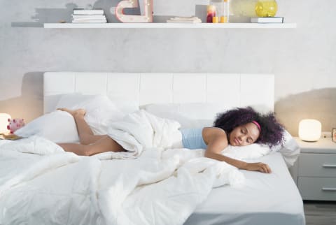 Woman sleeping in bed